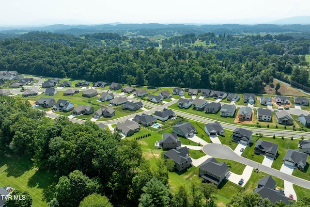 187 Tanners Cv, Johnson City, TN 37615 - aerial perspective of suburban area featuring a heavily wooded area