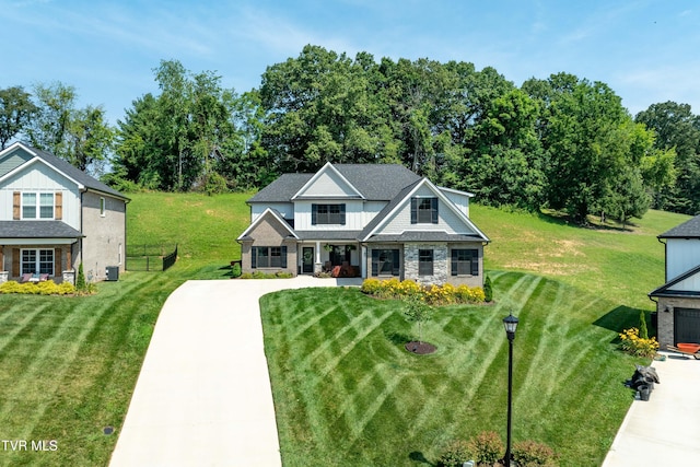 187 Tanners Cv, Johnson City, TN 37615 - craftsman inspired home with a front yard and stone siding
