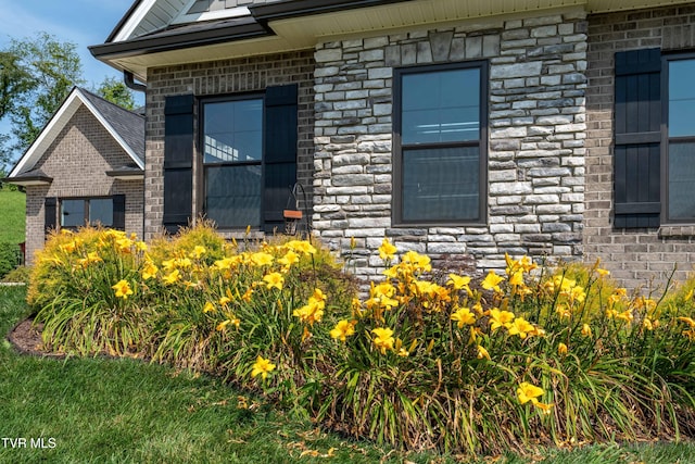 187 Tanners Cv, Johnson City, TN 37615 - doorway to property featuring stone siding and brick siding