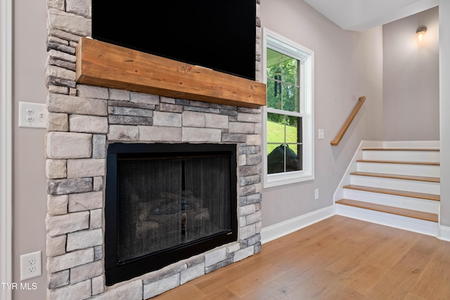 187 Tanners Cv, Johnson City, TN 37615 - detailed view of a stone fireplace and wood finished floors