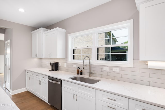 187 Tanners Cv, Johnson City, TN 37615 - kitchen with stainless steel dishwasher, white cabinetry, backsplash, and recessed lighting