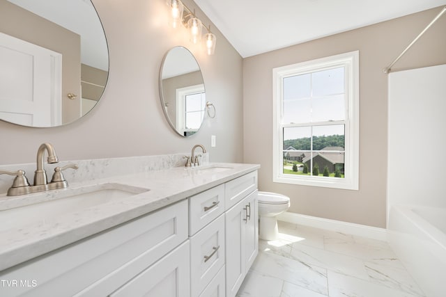 187 Tanners Cv, Johnson City, TN 37615 - full bath with healthy amount of natural light, double vanity, marble look tile flooring, and shower / washtub combination