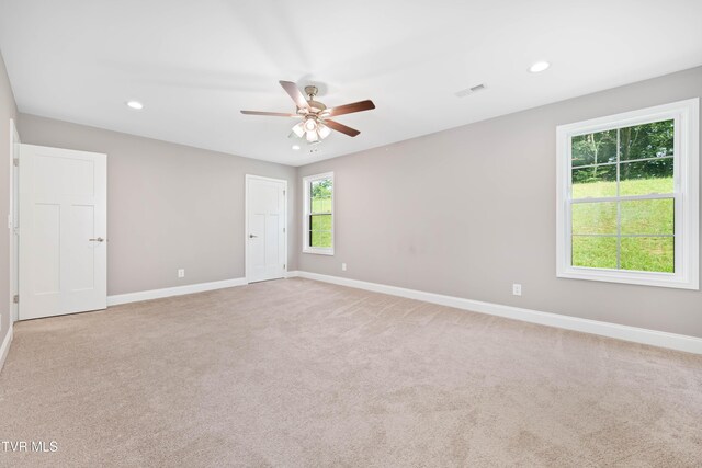 187 Tanners Cv, Johnson City, TN 37615 - unfurnished room with light colored carpet, recessed lighting, and a ceiling fan