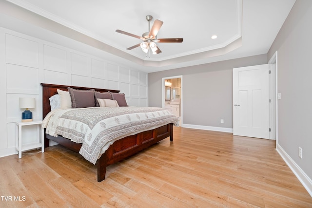 187 Tanners Cv, Johnson City, TN 37615 - bedroom featuring ornamental molding, light wood-style floors, a tray ceiling, recessed lighting, and ceiling fan