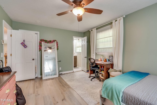 1136 W Shipley Ferry Rd, Kingsport, TN 37663 - bedroom with light wood finished floors and ceiling fan