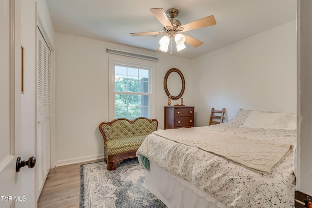 1136 W Shipley Ferry Rd, Kingsport, TN 37663 - bedroom featuring light wood-style flooring, a closet, and ceiling fan