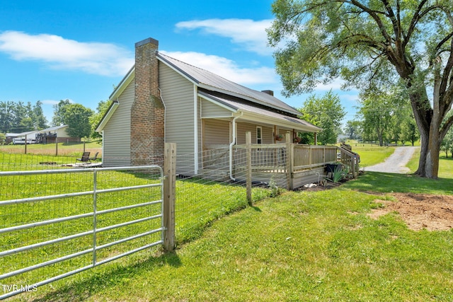 104 Kincheloe Rd, Fall Branch, TN 37656 - view of side of property with a chimney and an exterior structure