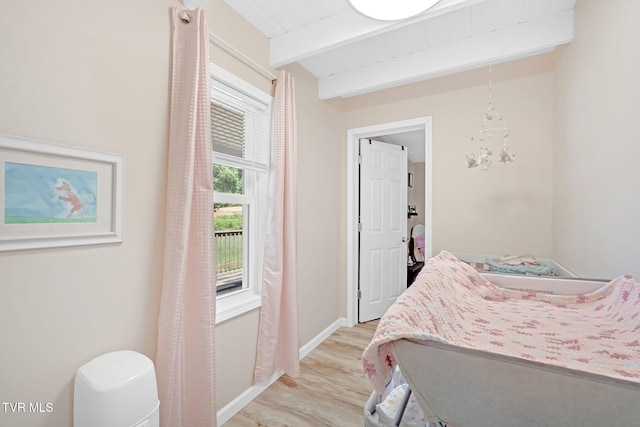 104 Kincheloe Rd, Fall Branch, TN 37656 - bedroom with light wood finished floors, a chandelier, and a wood ceiling with exposed beams
