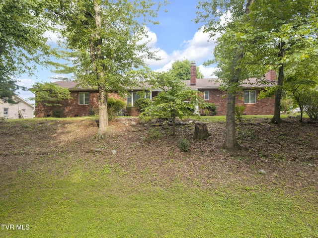 700 Sharon Dr, Johnson City, TN 37604 - view of front of home featuring a chimney and brick siding