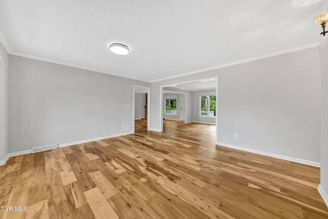 700 Sharon Dr, Johnson City, TN 37604 - spare room featuring light wood-style floors and crown molding