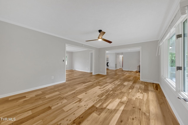700 Sharon Dr, Johnson City, TN 37604 - unfurnished living room with light wood-style flooring, healthy amount of natural light, crown molding, and ceiling fan