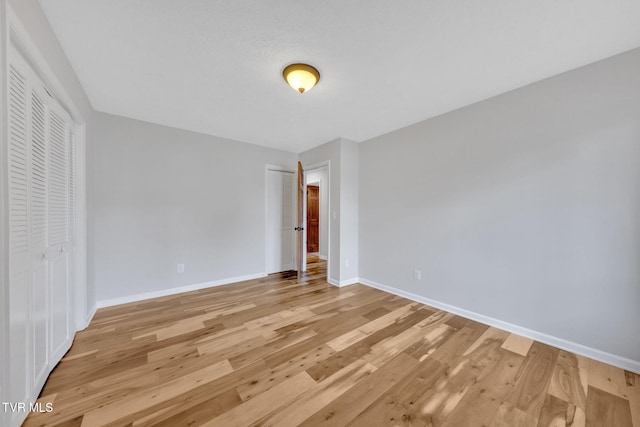 700 Sharon Dr, Johnson City, TN 37604 - unfurnished bedroom featuring baseboards and light wood-style flooring