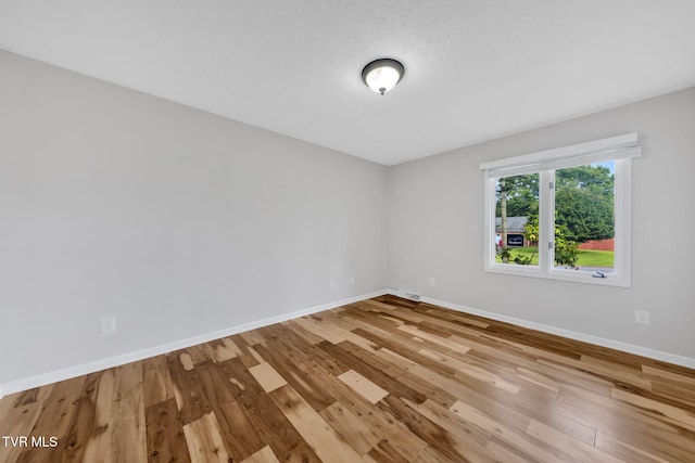 700 Sharon Dr, Johnson City, TN 37604 - unfurnished room with baseboards and wood finished floors