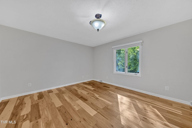 700 Sharon Dr, Johnson City, TN 37604 - spare room with light wood-style floors and baseboards