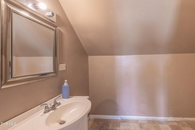 102 E Point Trce, Greeneville, TN 37745 - bathroom featuring lofted ceiling and baseboards