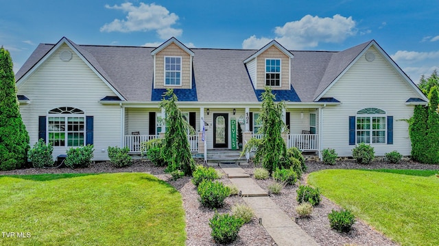 102 E Point Trce, Greeneville, TN 37745 - view of front facade featuring a porch, a front yard, and a shingled roof