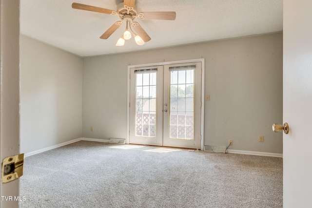 815 7th St Unit 815, Bristol, TN 37620 - spare room featuring french doors, carpet floors, a ceiling fan, and a textured ceiling