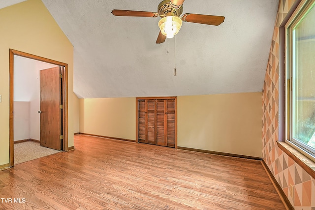 190 Sycamore Cir, Jonesborough, TN 37659 - empty room with lofted ceiling, light wood-style floors, a ceiling fan, and a textured ceiling