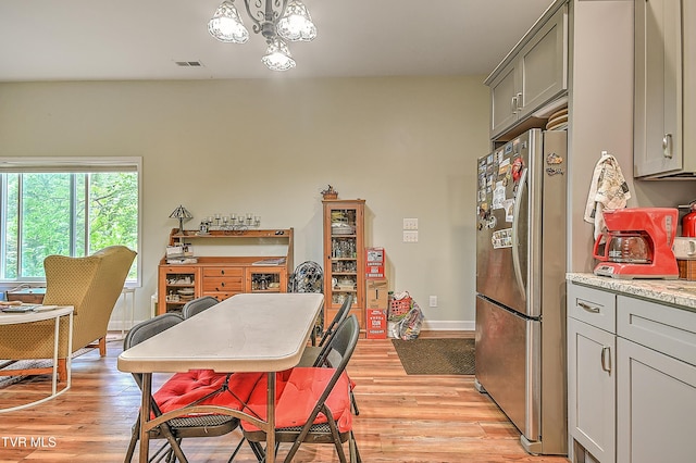 190 Sycamore Cir, Jonesborough, TN 37659 - dining space featuring light wood finished floors and a chandelier