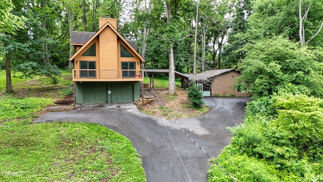 190 Sycamore Cir, Jonesborough, TN 37659 - chalet / cabin with driveway and a chimney