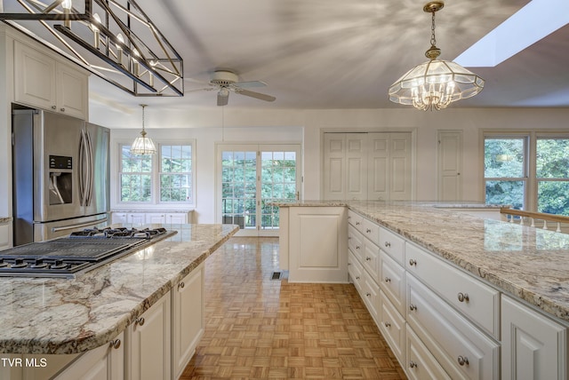 1710 Sundale Rd, Johnson City, TN 37604 - kitchen featuring stainless steel appliances, a chandelier, ceiling fan, and pendant lighting