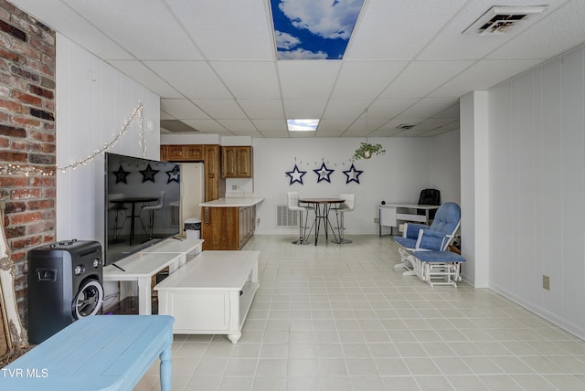 1710 Sundale Rd, Johnson City, TN 37604 - living room featuring a drop ceiling and light flooring