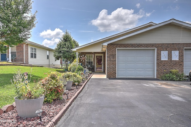 929 Cornerstone Ct, Kingsport, TN 37660 - ranch-style home featuring brick siding, an attached garage, driveway, and a front yard
