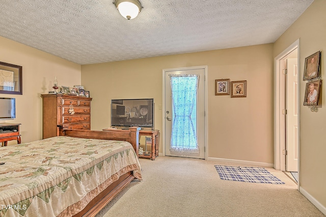 929 Cornerstone Ct, Kingsport, TN 37660 - carpeted bedroom featuring a textured ceiling and baseboards