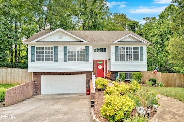 46 Taylor Ridge Ct, Johnson City, TN 37601 - bi-level home featuring driveway, an attached garage, and brick siding