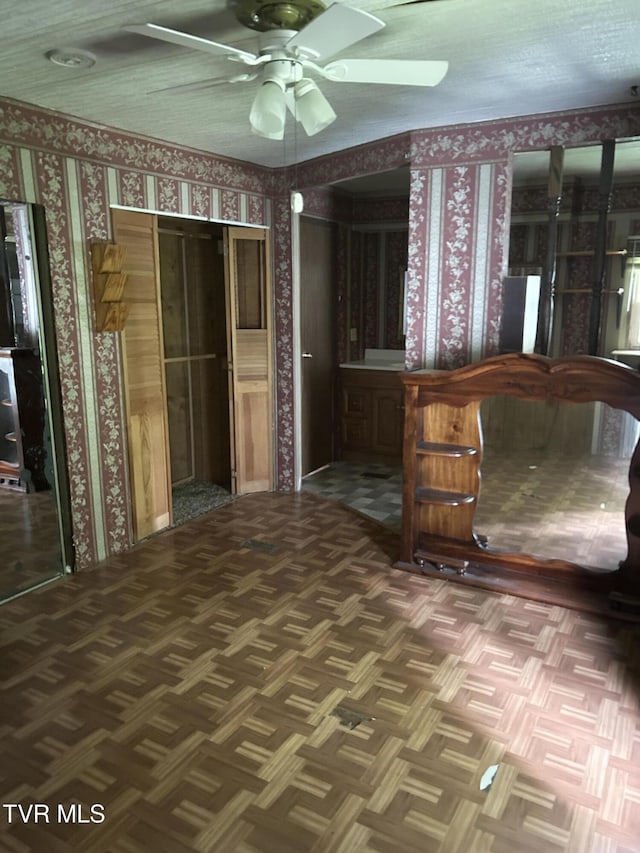 2703 Orr St, Big Stone Gap, VA 24219 - interior space featuring wallpapered walls and ceiling fan