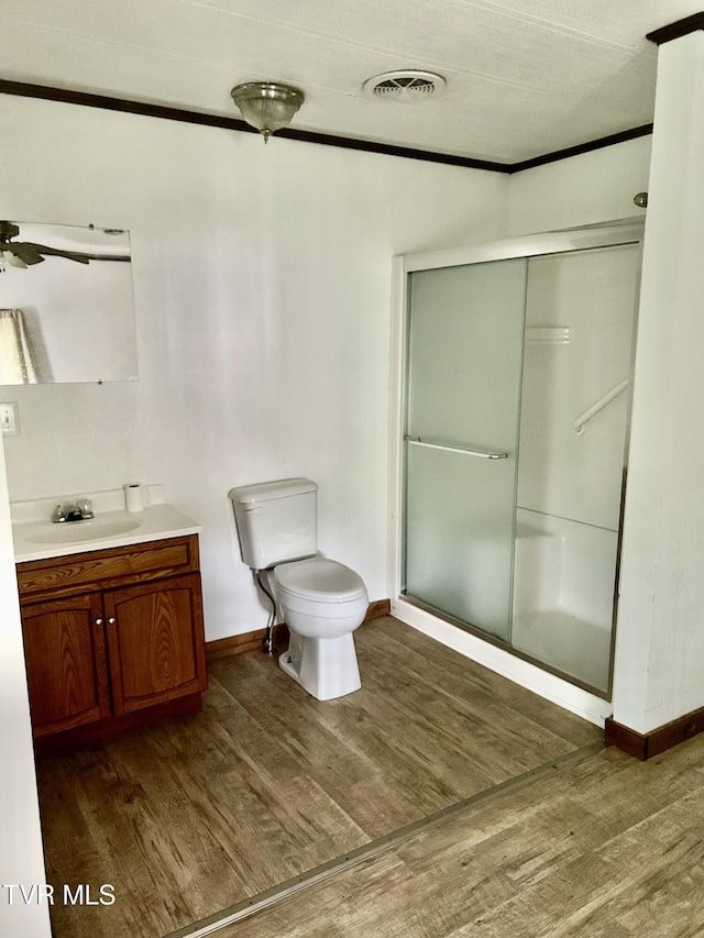 2703 Orr St, Big Stone Gap, VA 24219 - bathroom with wood finished floors, vanity, a stall shower, and ceiling fan
