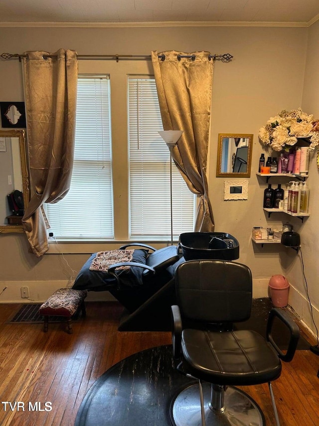 402 E Unaka Ave, Johnson City, TN 37601 - living area with wood-type flooring, crown molding, and healthy amount of natural light
