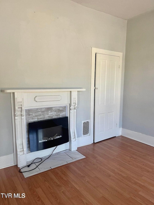402 E Unaka Ave, Johnson City, TN 37601 - detailed view of wood finished floors and a fireplace