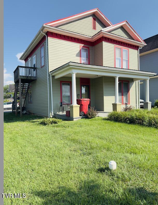 402 E Unaka Ave, Johnson City, TN 37601 - view of front of property with a porch, stairs, and a front yard