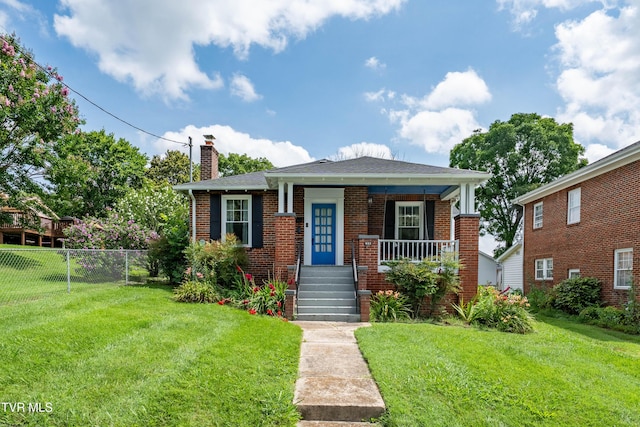 922 W Hillcrest Dr, Johnson City, TN 37604 - bungalow-style house featuring a chimney, a porch, and brick siding