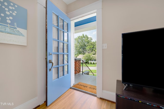 922 W Hillcrest Dr, Johnson City, TN 37604 - doorway to outside with light wood-type flooring and baseboards