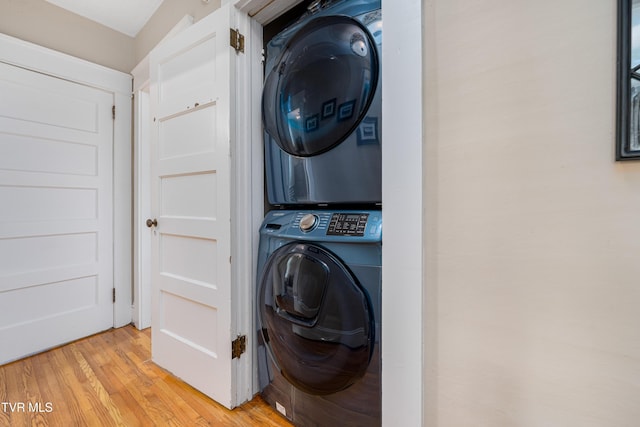 922 W Hillcrest Dr, Johnson City, TN 37604 - washroom featuring stacked washing machine and dryer and light wood-style floors