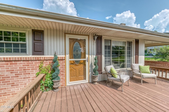 224 Meadow Dr, Bristol, TN 37620 - view of exterior entry with brick siding, board and batten siding, and covered porch