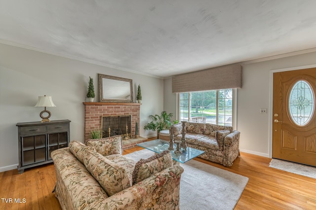 224 Meadow Dr, Bristol, TN 37620 - living area featuring wood finished floors, a fireplace, and crown molding