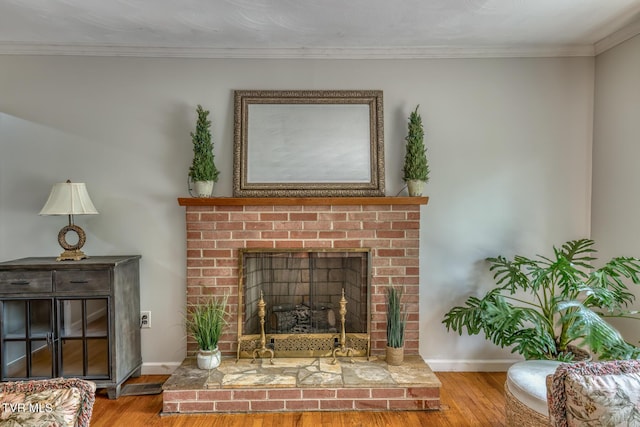 224 Meadow Dr, Bristol, TN 37620 - living room with wood finished floors, ornamental molding, and a brick fireplace