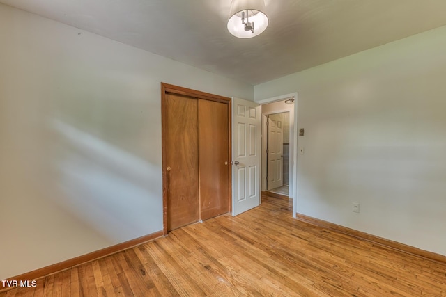 224 Meadow Dr, Bristol, TN 37620 - unfurnished bedroom featuring light wood-style floors and a closet