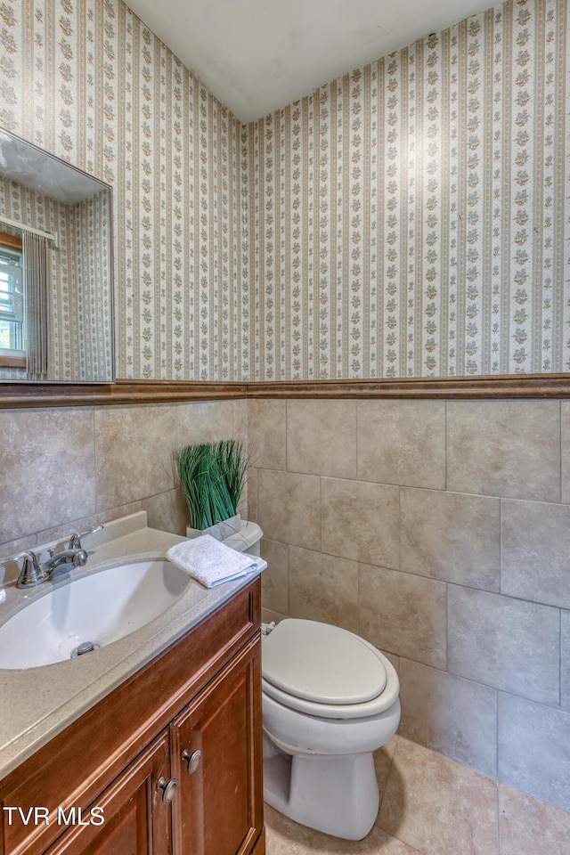 224 Meadow Dr, Bristol, TN 37620 - half bathroom featuring vanity and tile walls