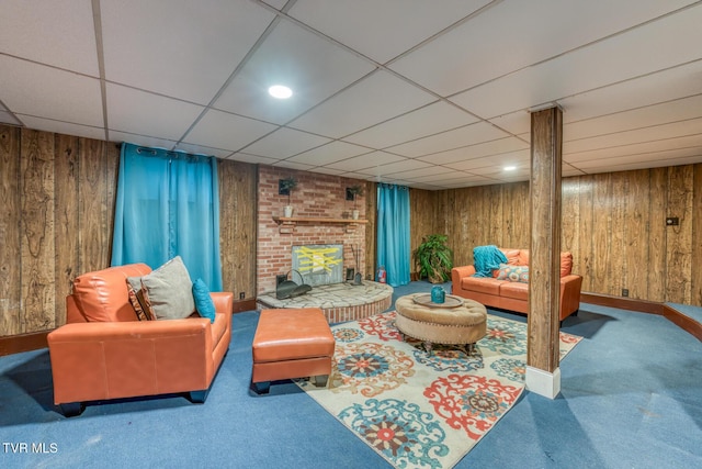 224 Meadow Dr, Bristol, TN 37620 - living room featuring carpet flooring, wooden walls, and a paneled ceiling