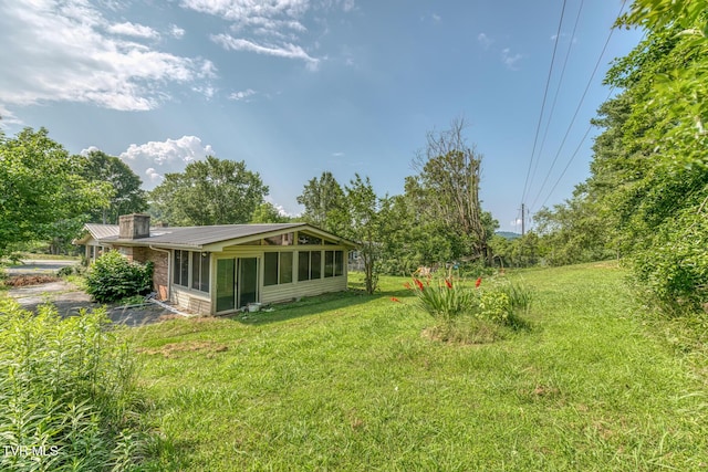 224 Meadow Dr, Bristol, TN 37620 - view of green lawn with a sunroom