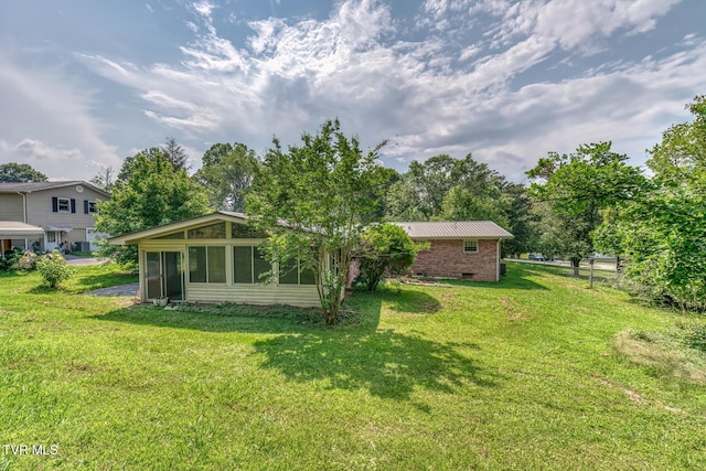 224 Meadow Dr, Bristol, TN 37620 - view of green lawn with a sunroom