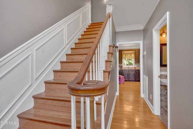 504 Amelia Ct, Blountville, TN 37617 - stairs featuring ornamental molding and wood finished floors