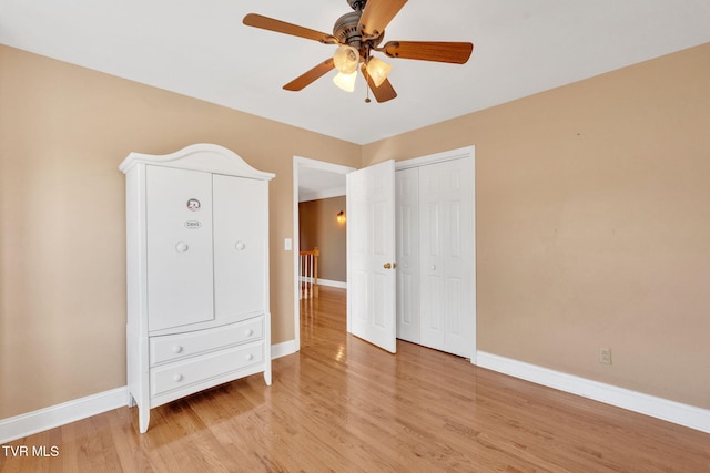 504 Amelia Ct, Blountville, TN 37617 - unfurnished bedroom featuring light wood-type flooring, a closet, and a ceiling fan
