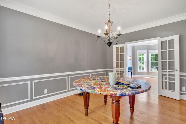 504 Amelia Ct, Blountville, TN 37617 - dining space with a chandelier, crown molding, french doors, and wood finished floors