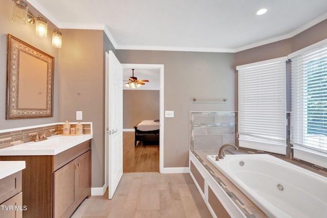 504 Amelia Ct, Blountville, TN 37617 - ensuite bathroom featuring a whirlpool tub, vanity, a ceiling fan, ornamental molding, and wood finished floors