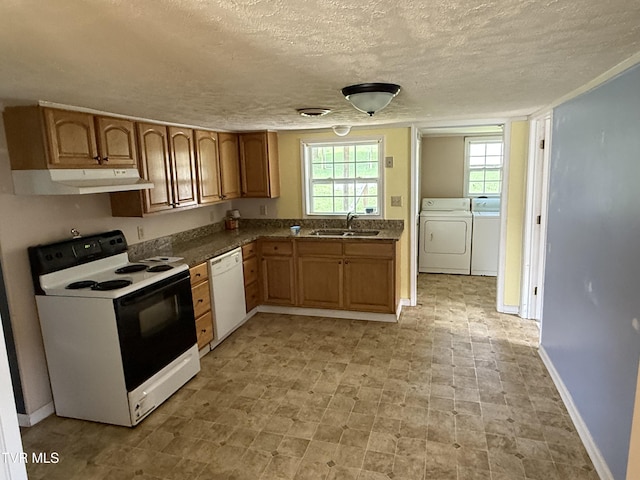 3126 Blackburn Ave, Kingsport, TN 37660 - kitchen with white appliances, under cabinet range hood, washer and dryer, a textured ceiling, and dark countertops